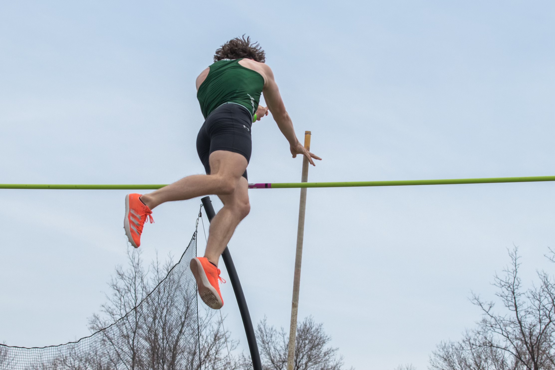 Colorado State University student Drew Thompson pole vaults.